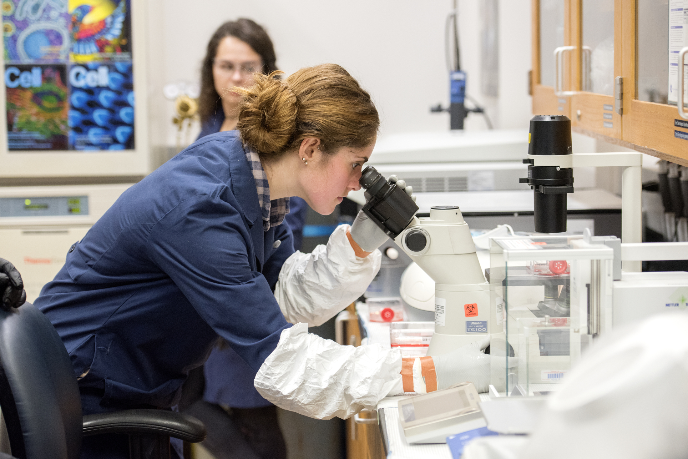 student and faculty in research lab