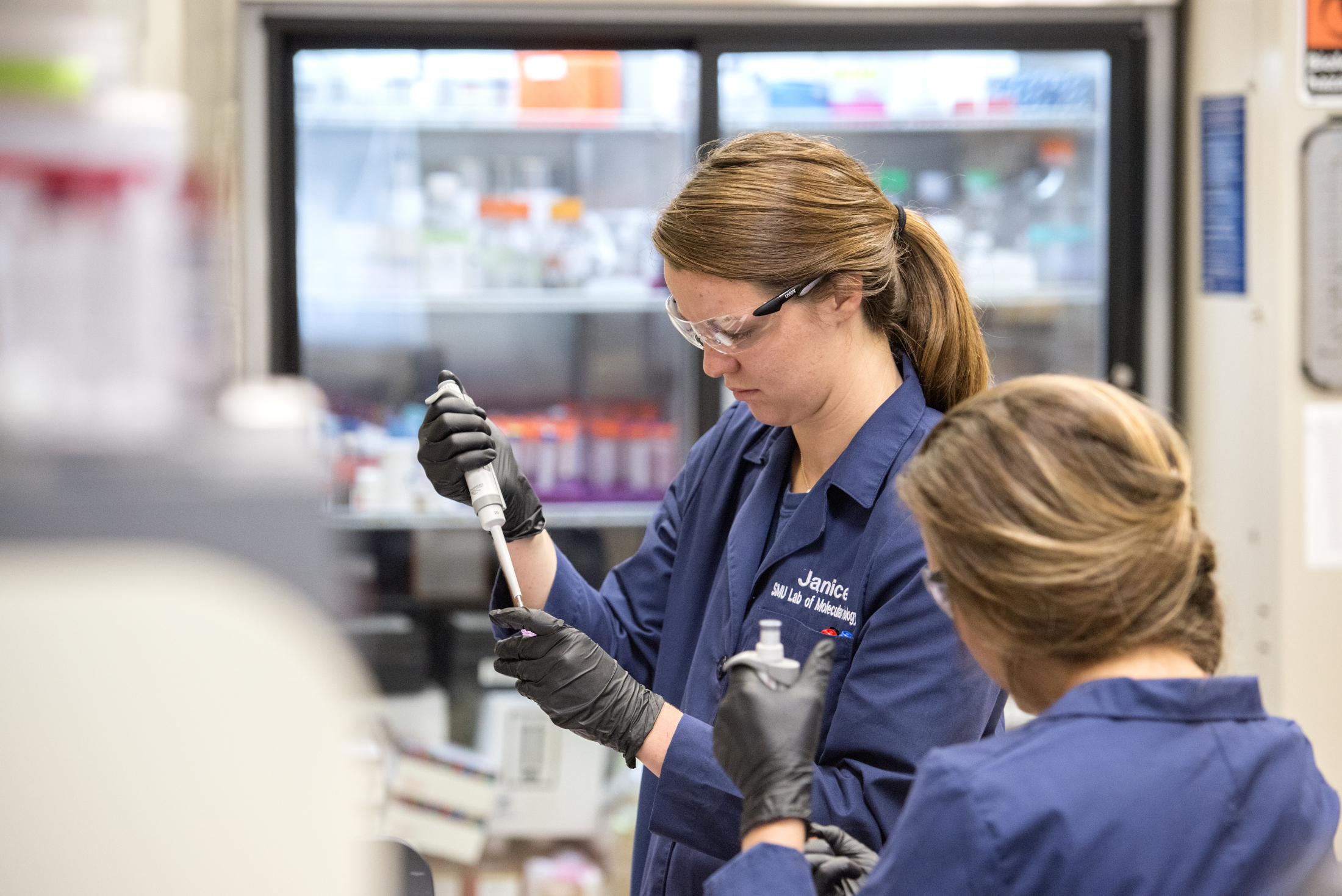 student in a biology lab