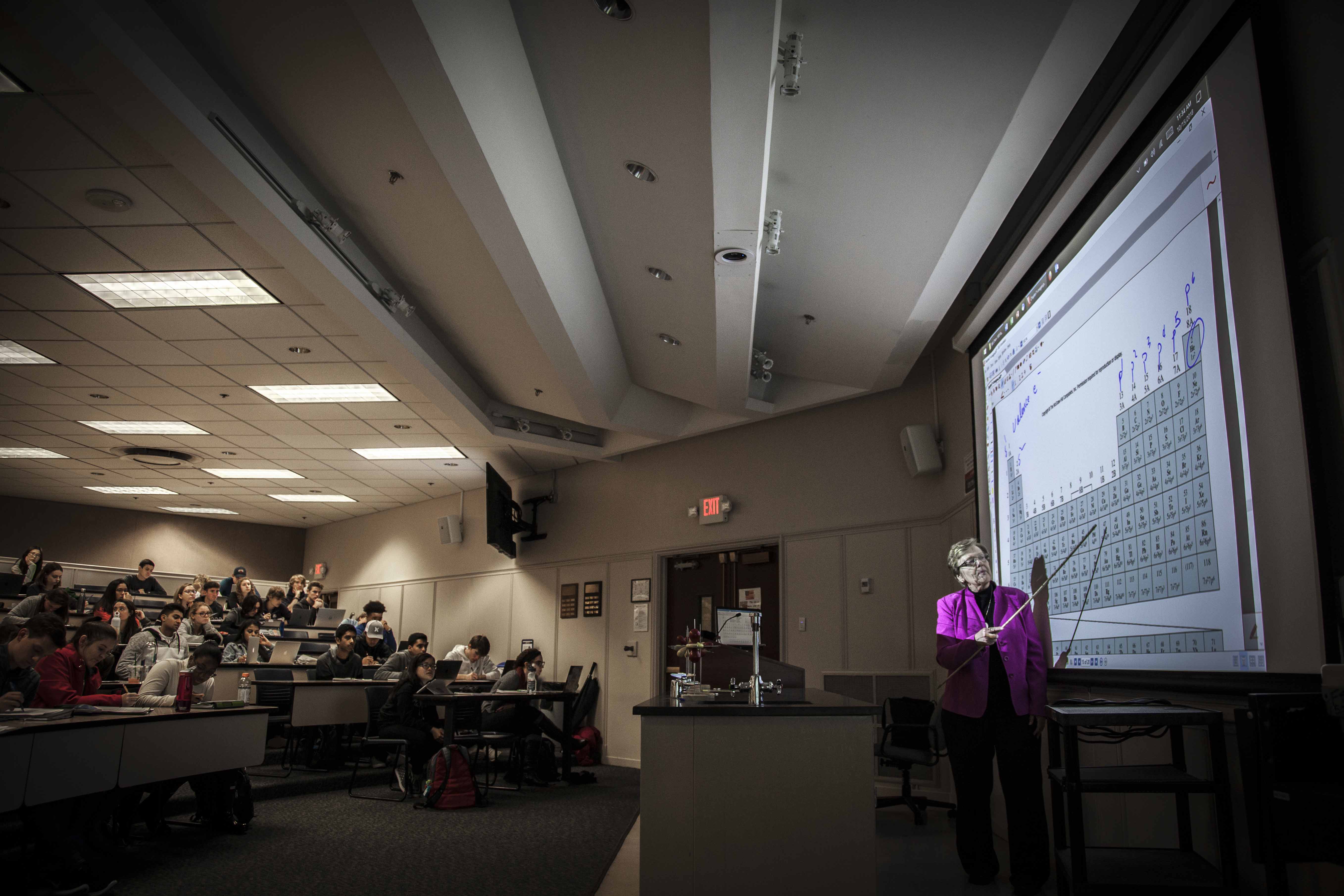 girl at exhibit booth