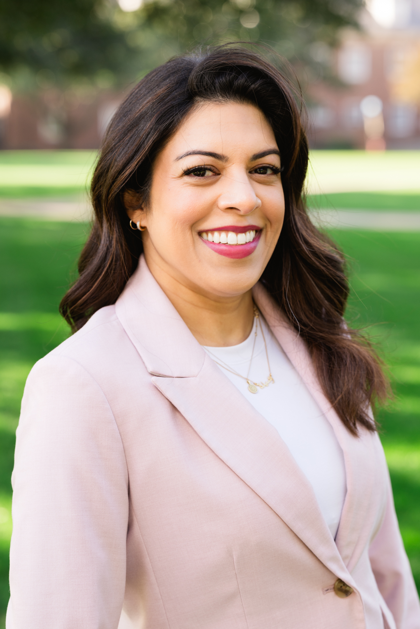 Photo of Rashida Shafiq in a pink blazer