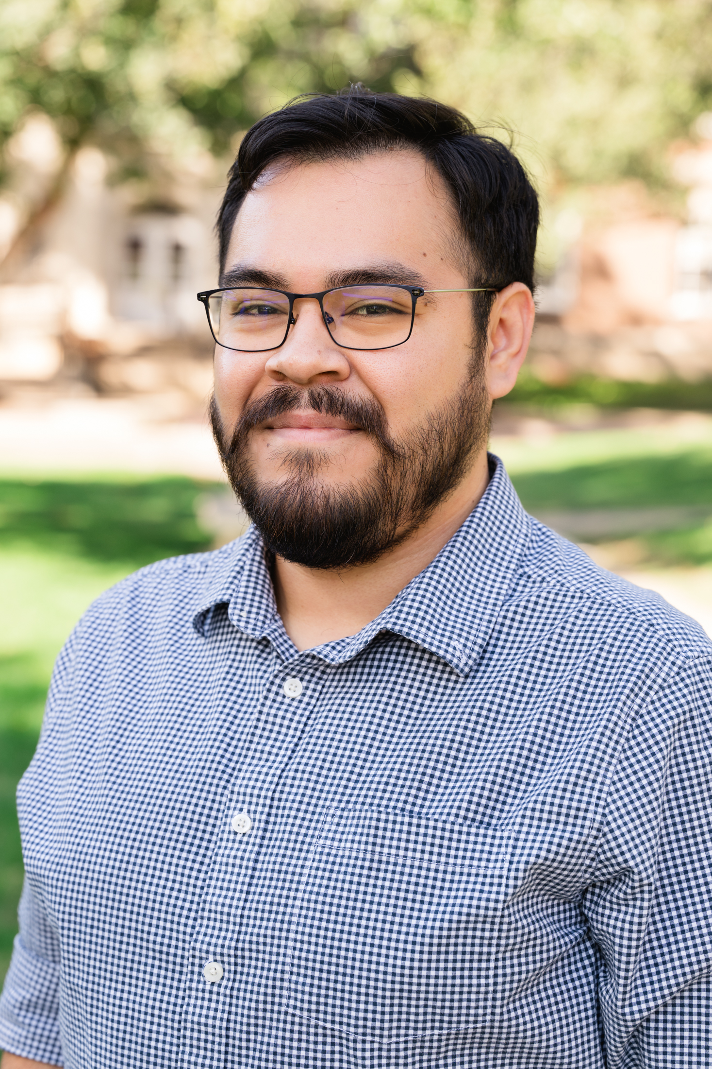 Eugene Alviar blue button up shirt