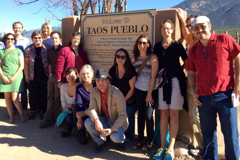 Several history faculty members from SMU’s  Clements Center for Southwest Studies gather at Taos Pueblo.