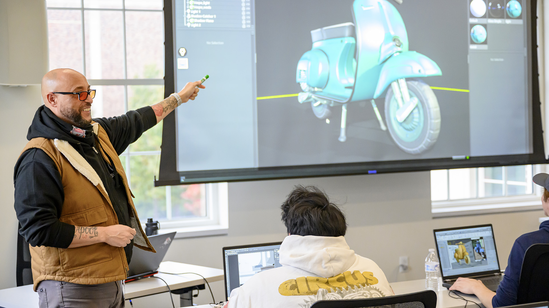 A photo of a SMU Guildhall professor teaching class