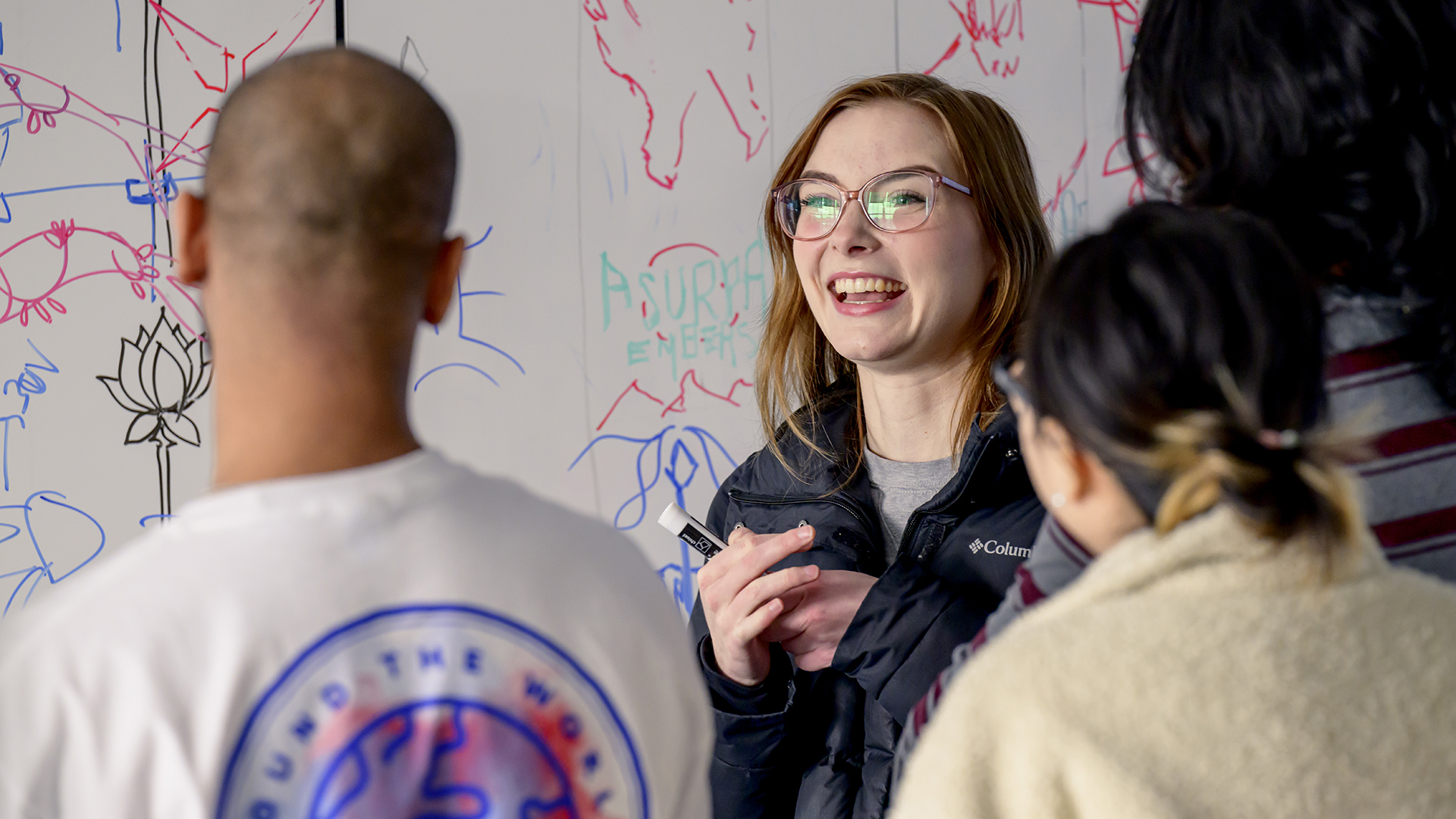 Photo of SMU Guildhall students smiling and talking