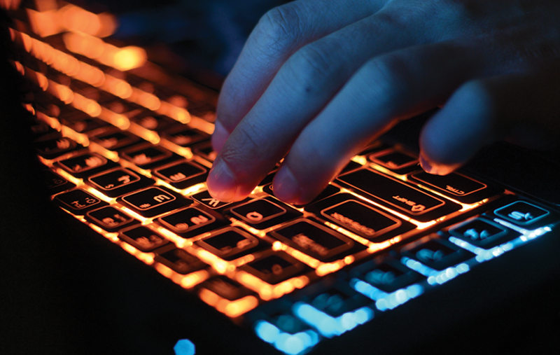 Photo of student working on a keyboard