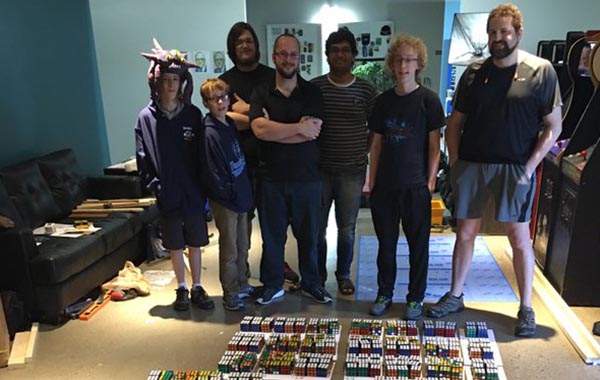 SMU Guildhall students build a mural of Ralph Baer out of more than 600 Rubik Cubes