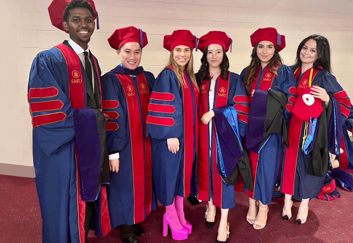 SMU Law graduates - fun pink shoes on female grad