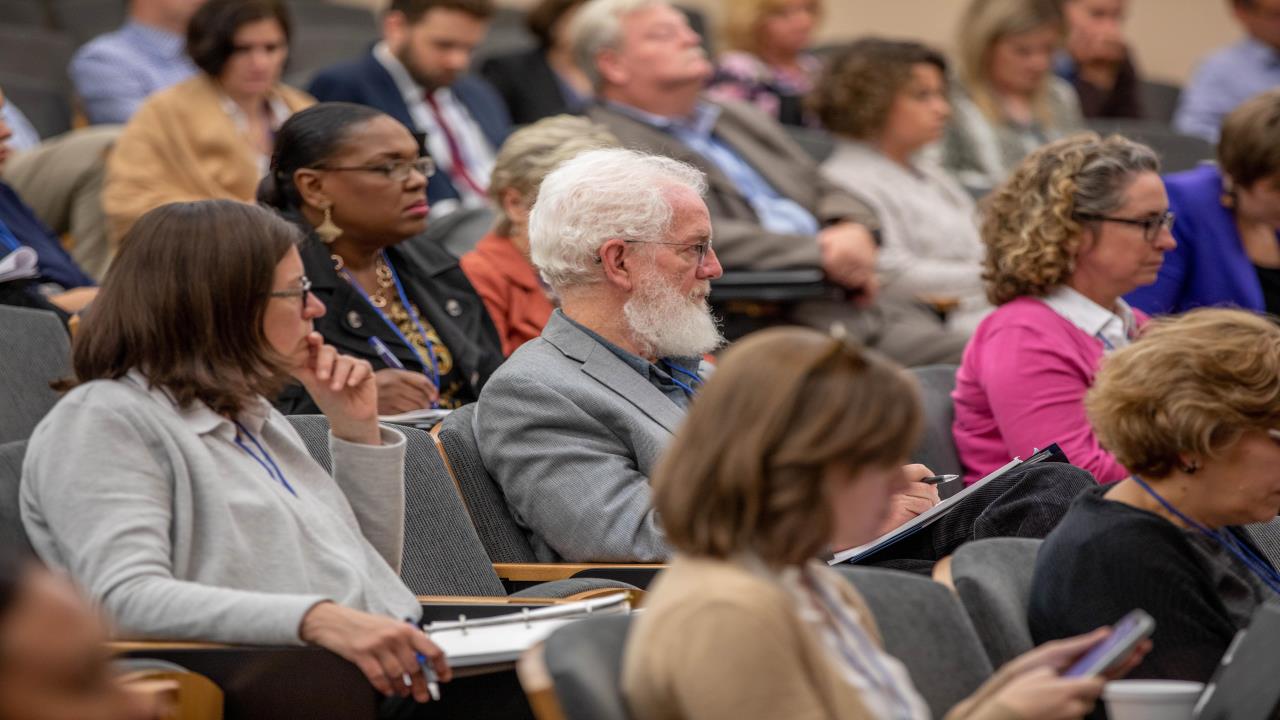 An group of stakeholders learning more about criminal justice reform.