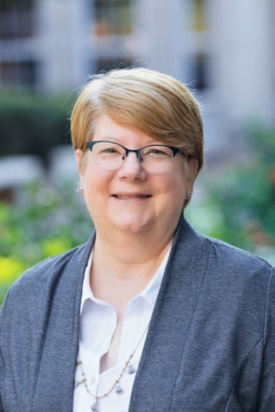 Elizabeth Killingsworth outdoors, smiling 