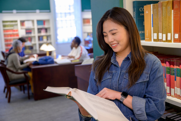 student reading a book 