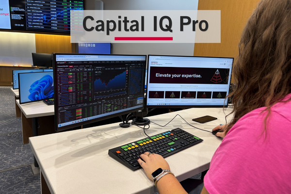 Student at computer using Capital IQ Pro database