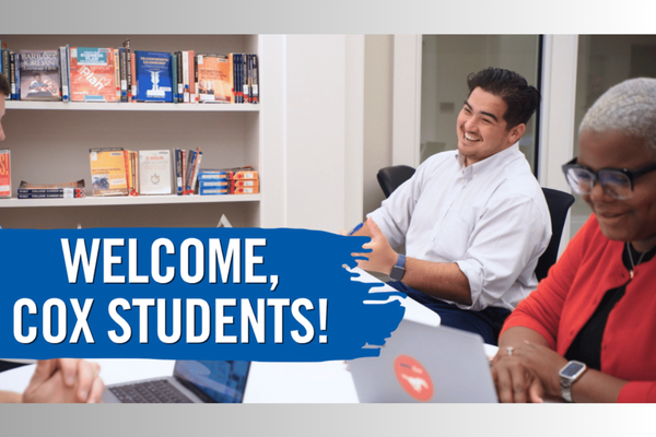 Welcome Cox Students! (students studying at a table in the Duda Family Business Library)