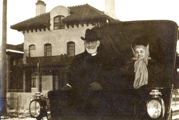 Photograph of John Vincent and his wife in an early automobile
