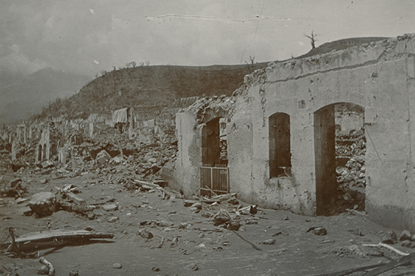 [View of buildings and rubble in St. Pierre, Martinique, after eruption of Mt. Pelee]