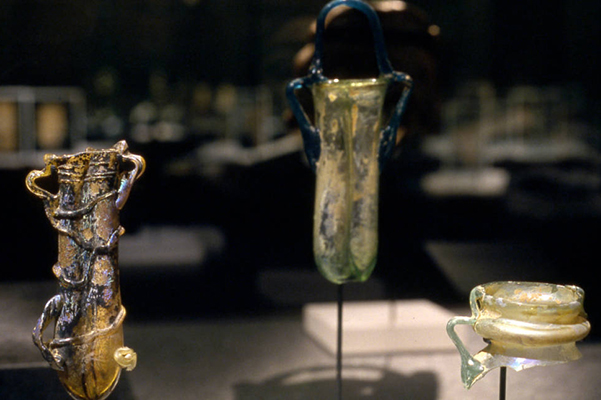 Detail of yellow Roman glass bottles