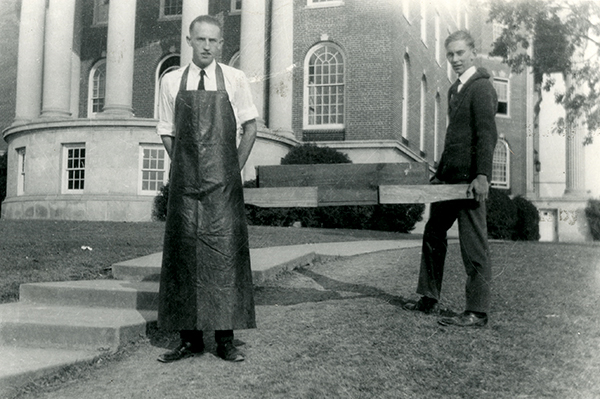 Students transferring books from the Dallas Hall Library to Kirby Hall