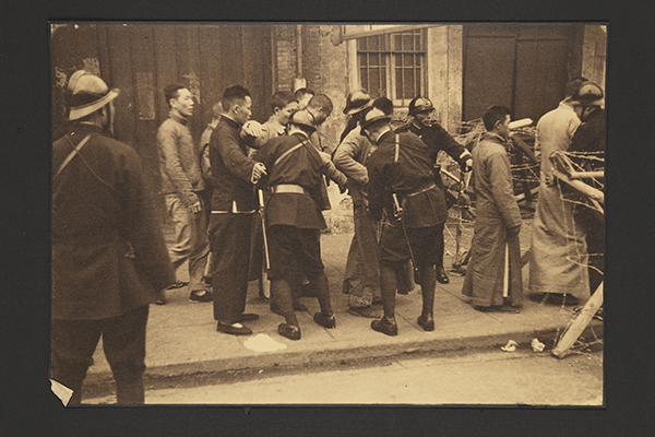 [Chinese Civilians with Japanese Soldiers at Checkpoint]