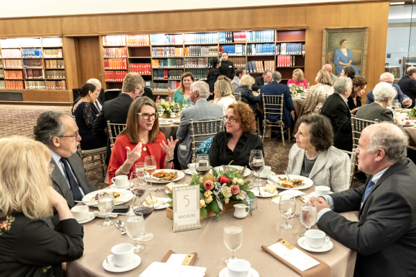 Table host Krys Boyd talks to her table at Tables of Content