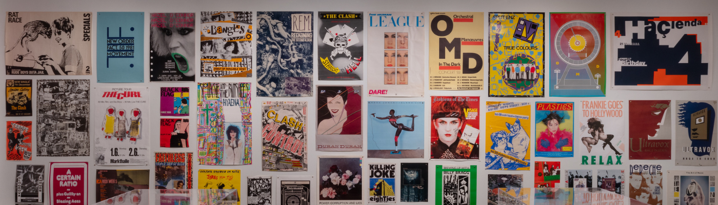 colorful music posters on the wall of Hawn Gallery