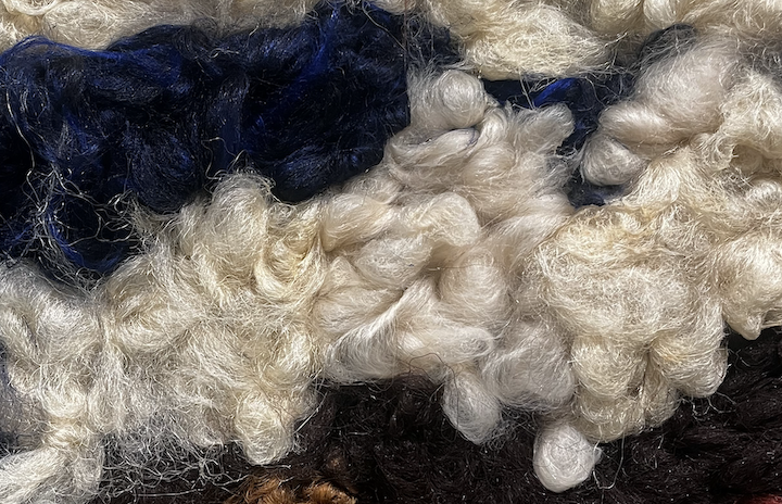 close up of artwork made of synthetic hair