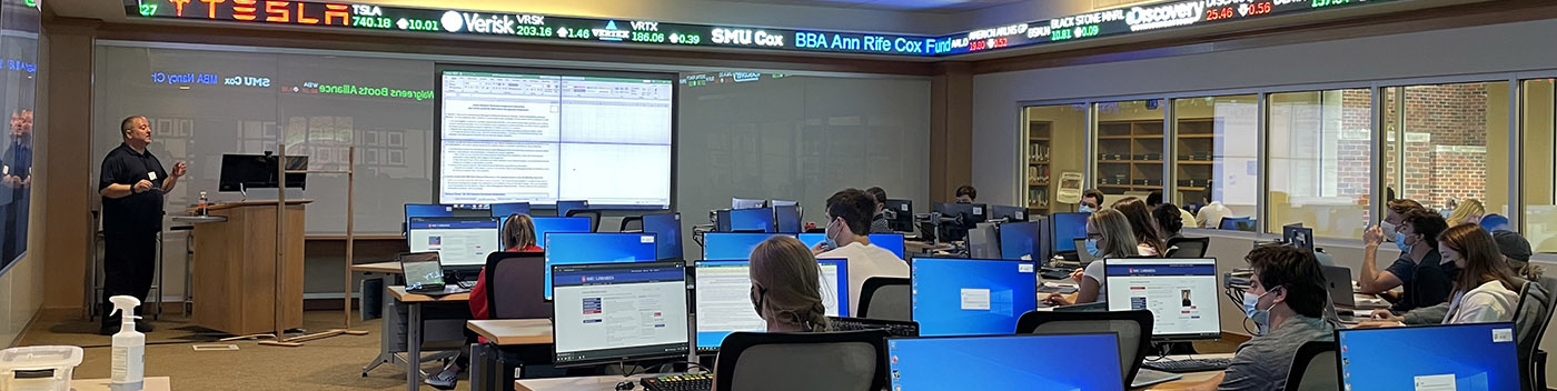 business librarian teaching workshop to students in the Kitt Investing and Trading Center