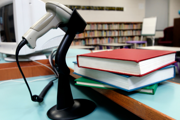 woman smiling at desk