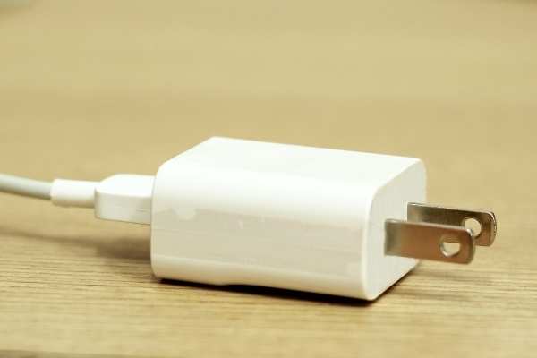 hand typing on calculator