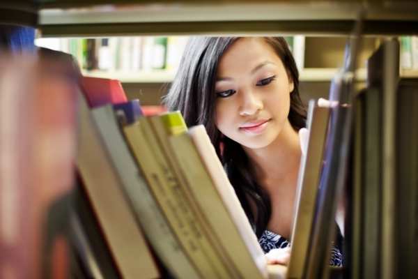 woman smiling at desk