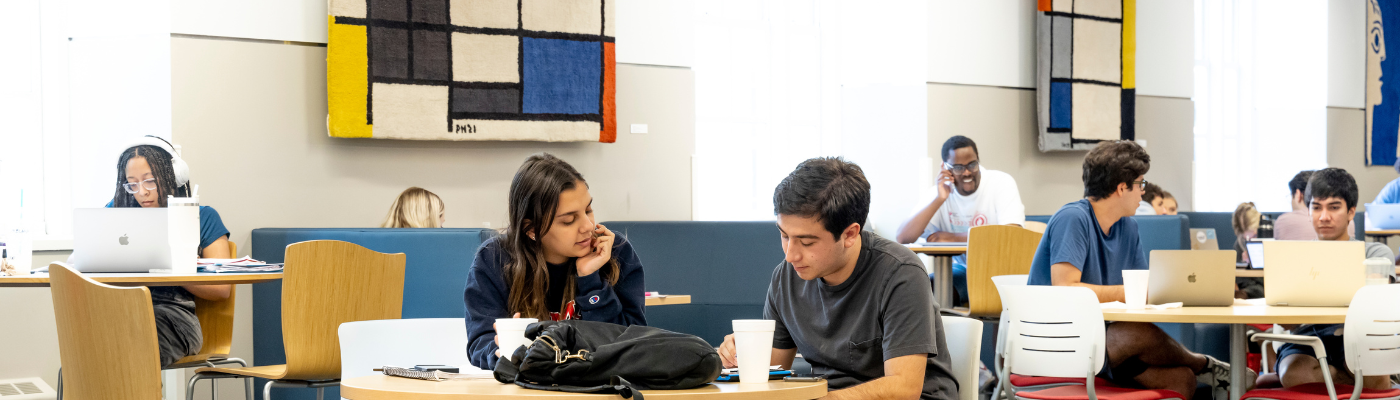 Students studying near the Fondren Library Starbucks