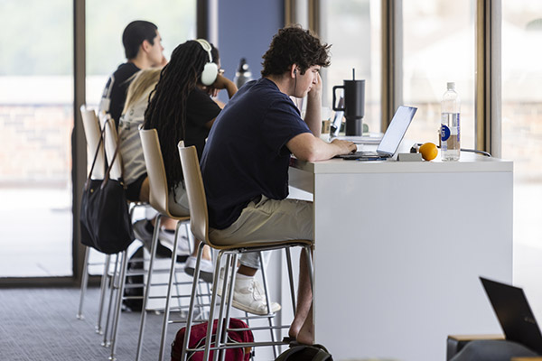 students in Fondren Library fourth floor study area