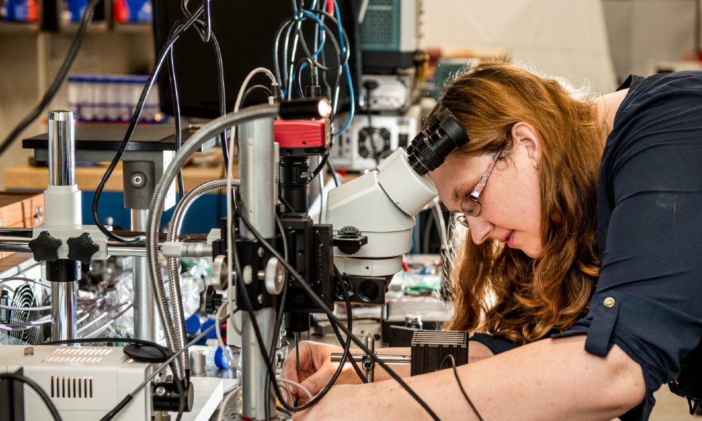 An SMU Lyle quantum engineering graduate student works on cutting-edge technology in a research lab.