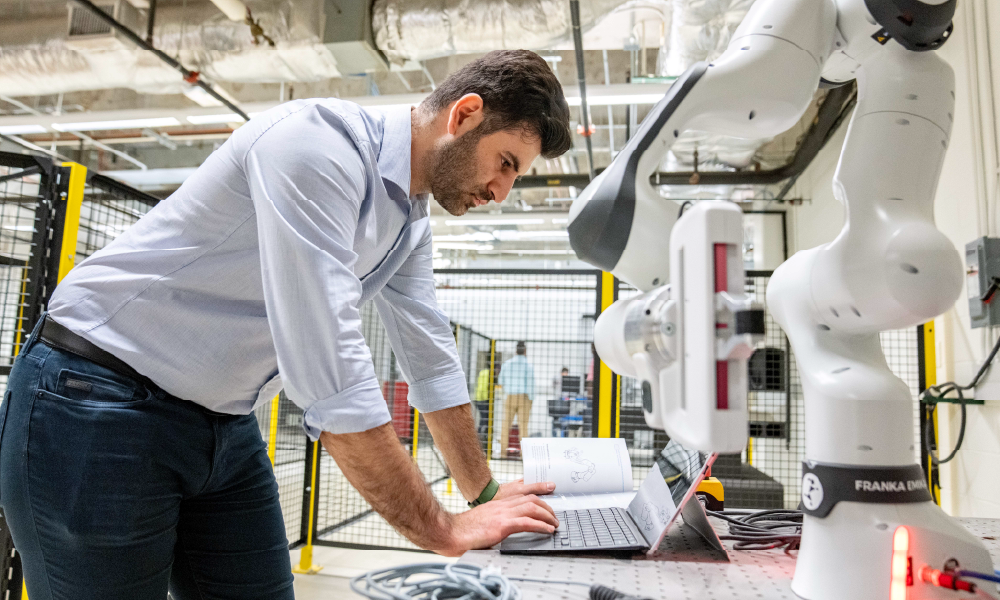 SMU Lyle mechanical engineering graduate students work in a state-of-the-art robotics lab.