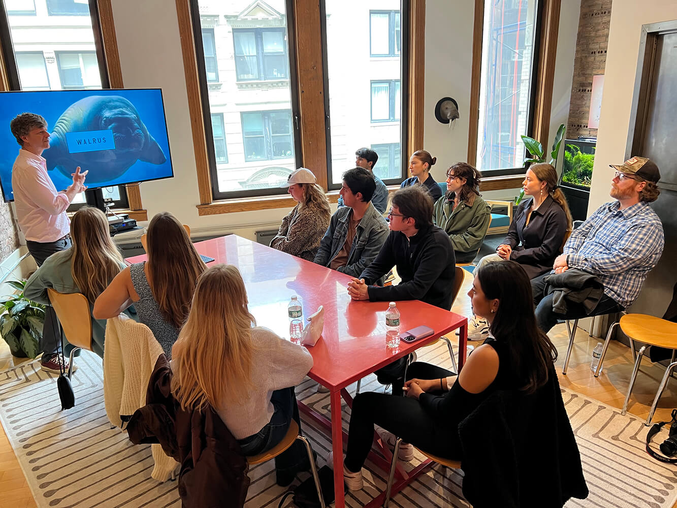 large student group inside advertising agency