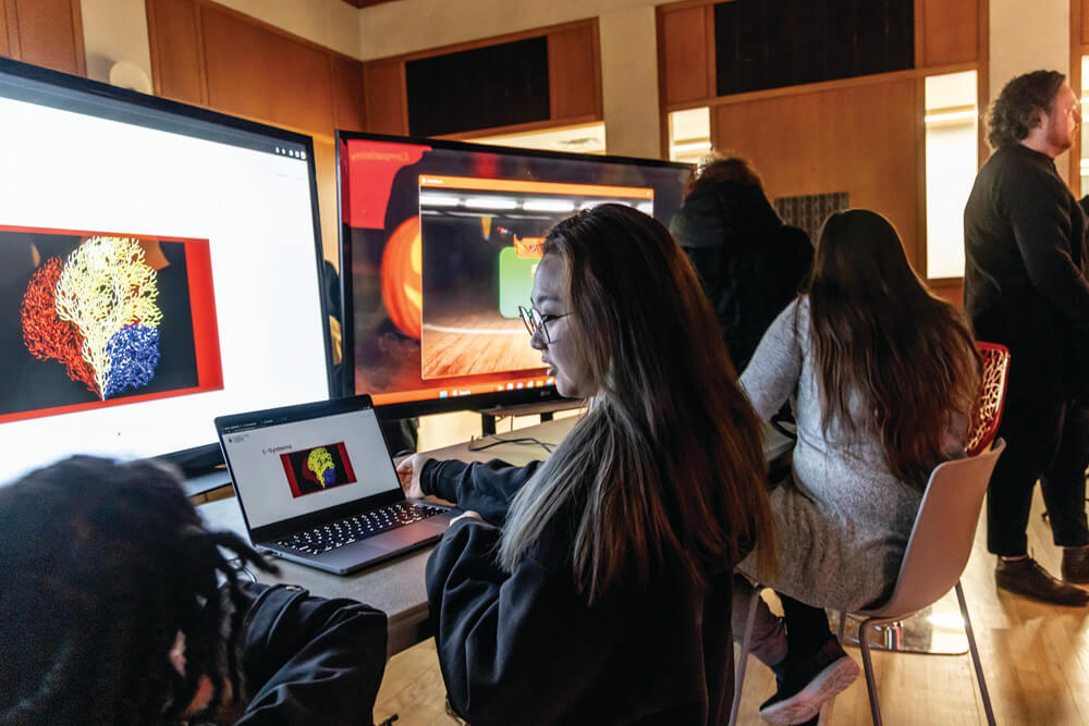 students working at computer