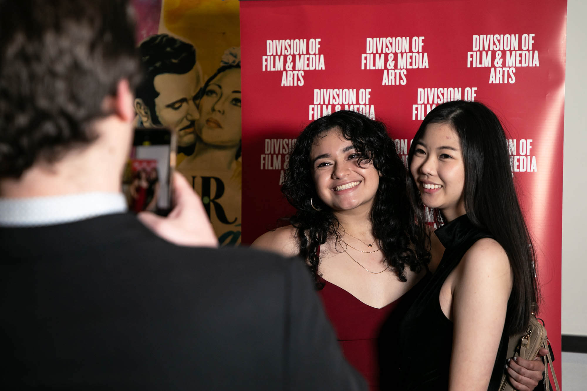 girls pose for a picture