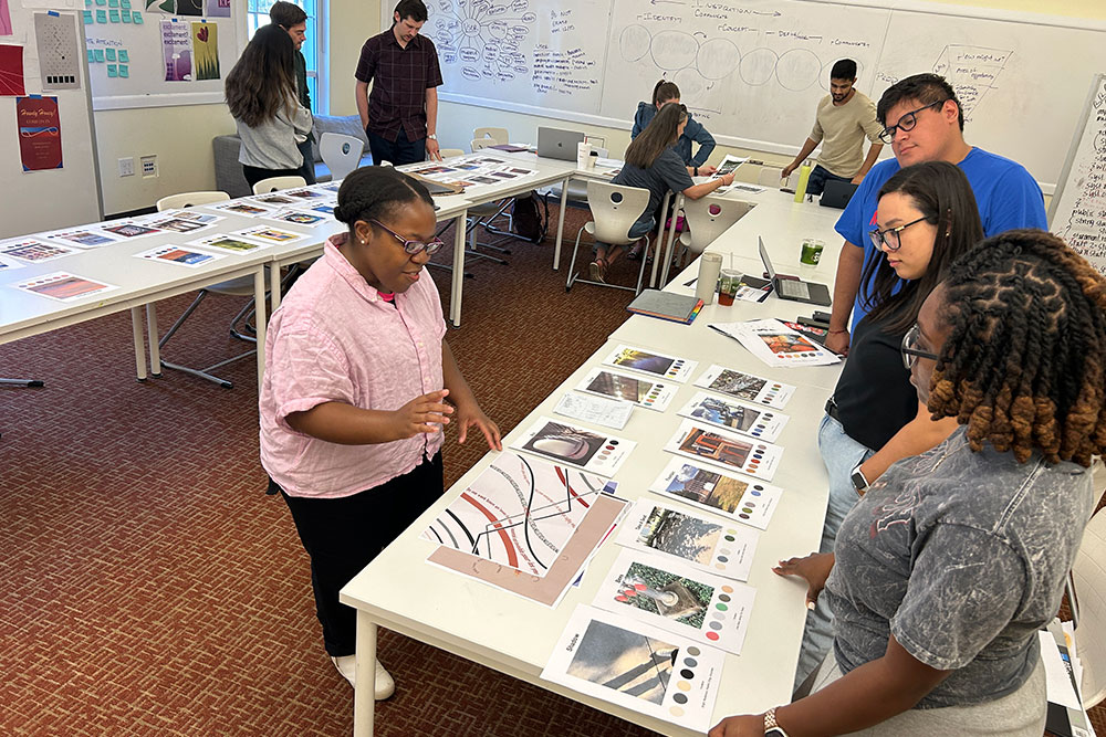 students work around a table