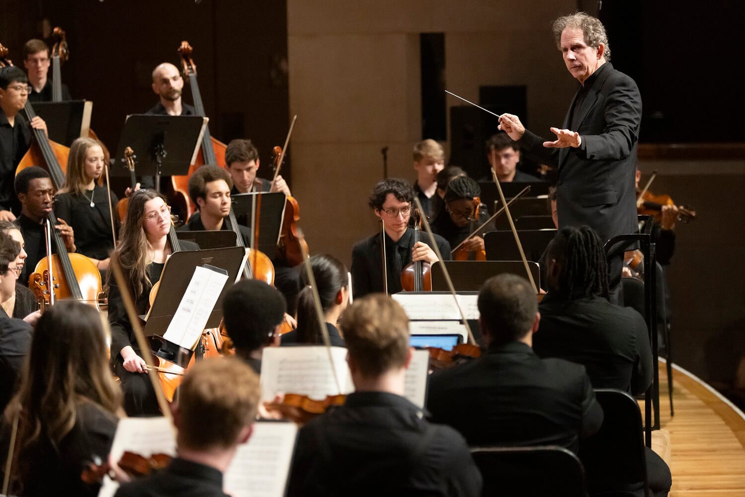 conductor with orchestra