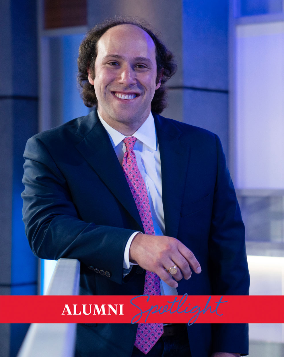 Journalism and film alum Alan Rose (B.A. '10) poses in the WFAA television station where he worked as an executive producer.