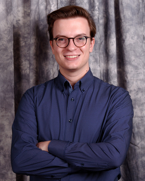 Engaged Learning Fellow and Meadows student Theo Morris poses for a photo.