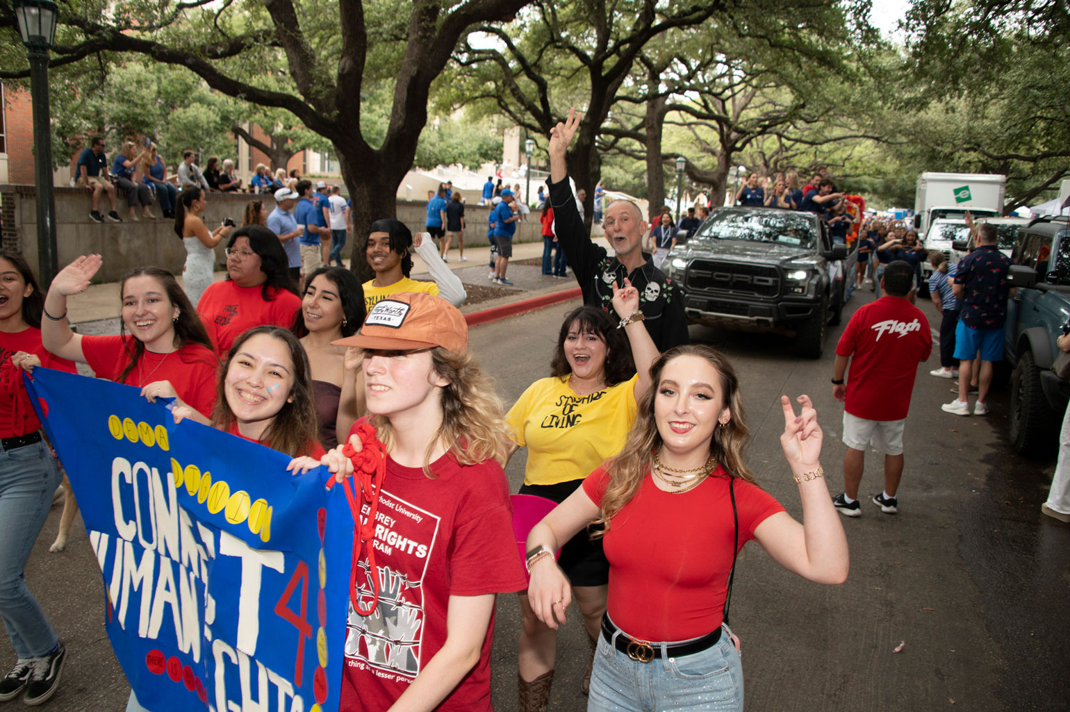 students in the smu homecoming parade