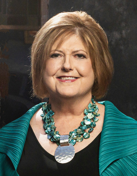 Headshot of journalism alum Mary Collins (B.F.A. '79)