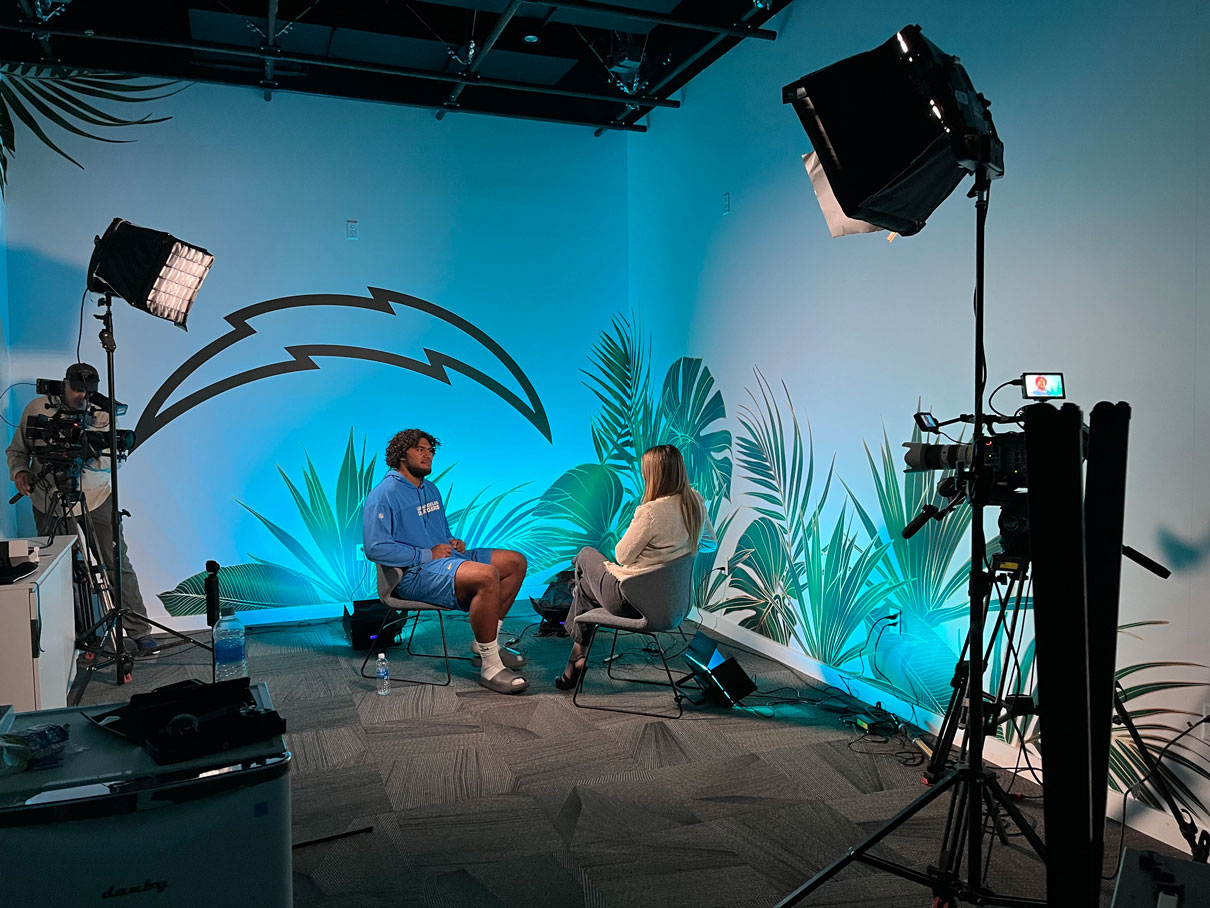 Interview with NFL Chargers player Tuli Tuipulotu in studio