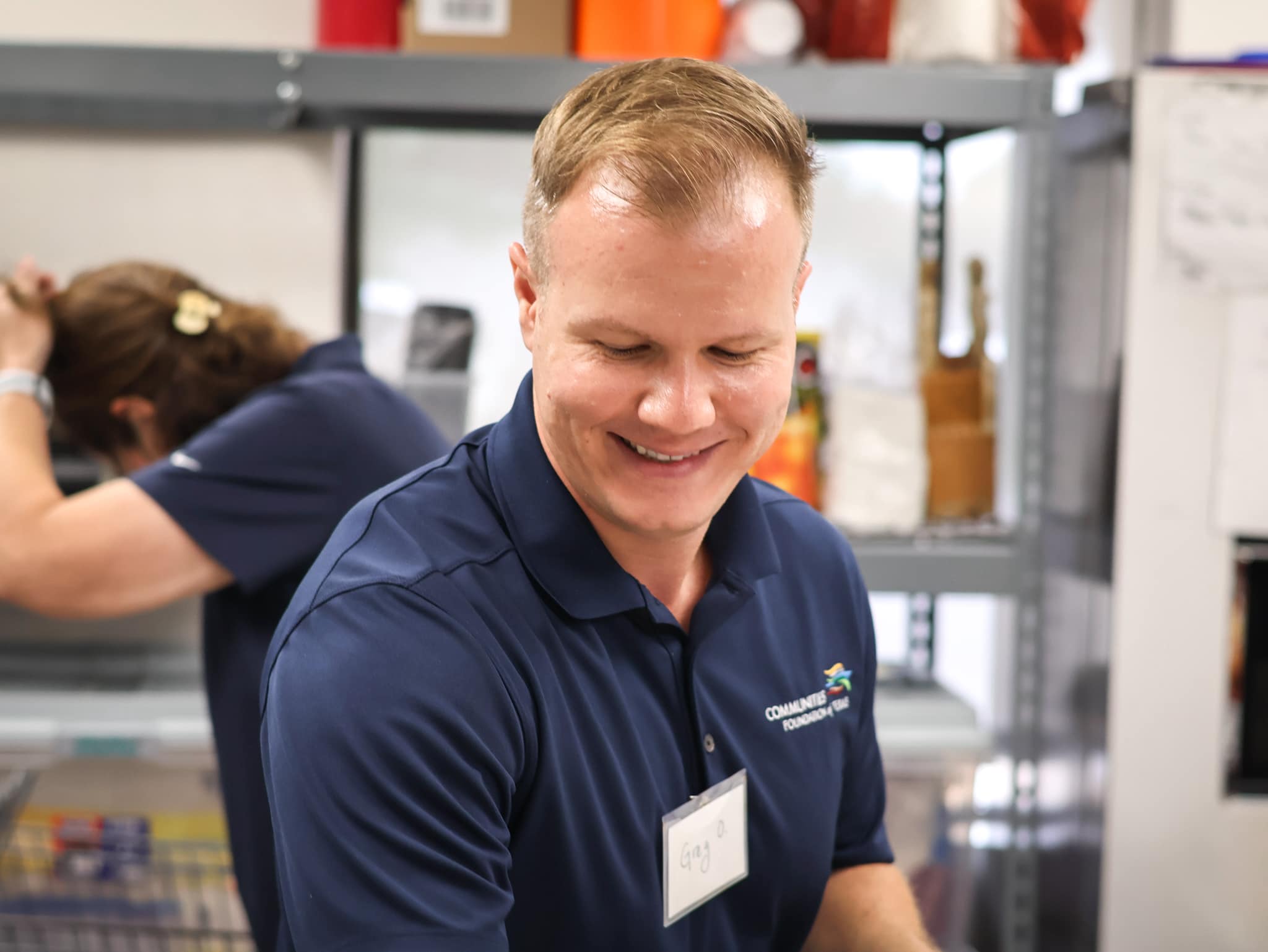 M.A./MBA alum Greg Oertel volunteering at Harmony CDC