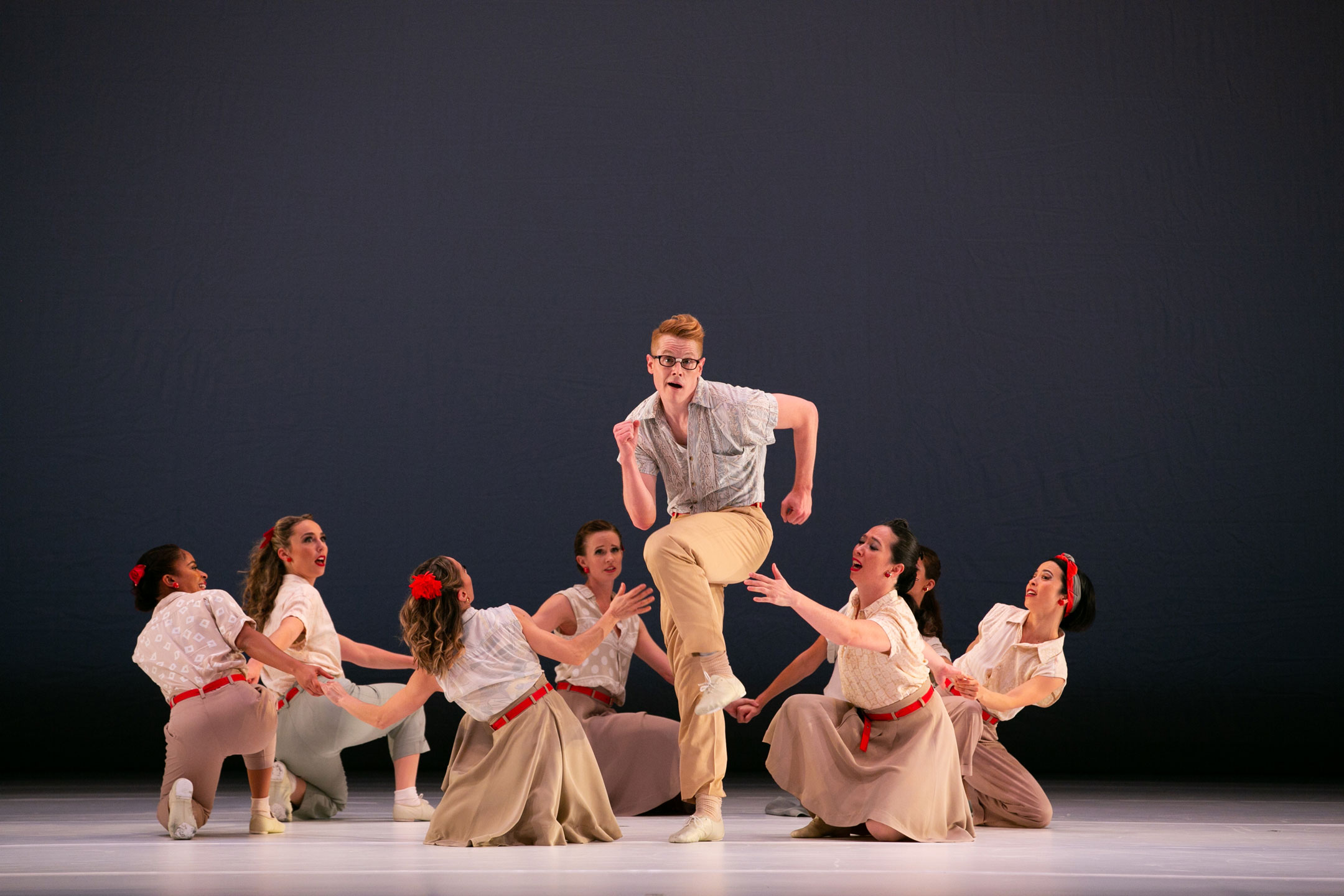 Dance alum Lee Duveneck dances on stage with company in Company B, photo by Whitney Browne