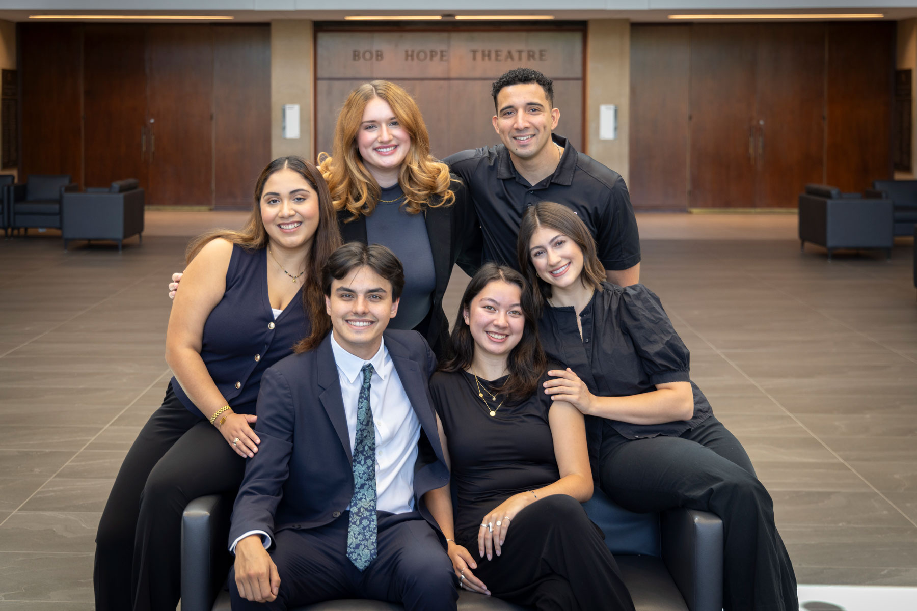 Six students who participated in last year's SMU Meadows Intern Fellowship program pose