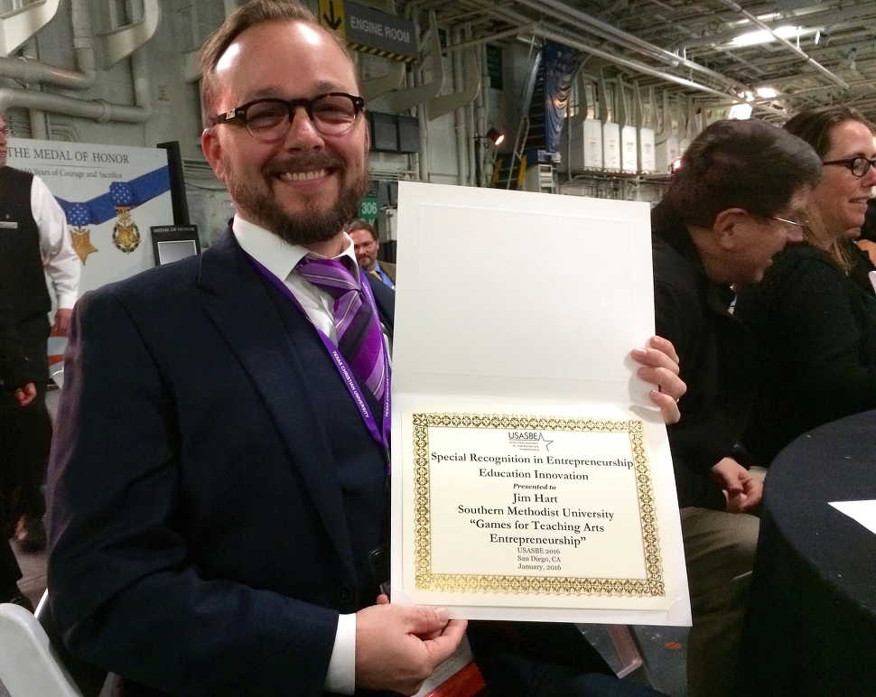 Jim Hart showcases an award