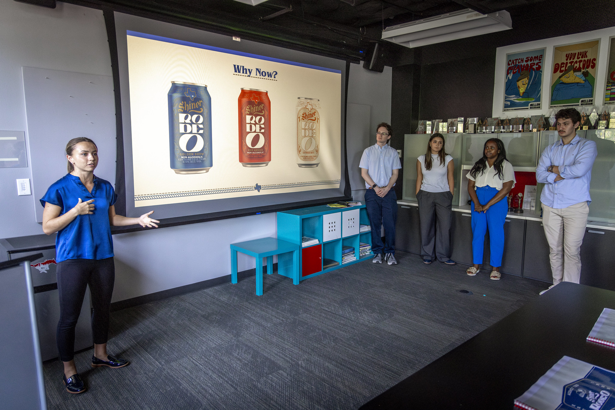 Students in SMU’s Bachelor of Arts in Advertising program share a product presentation in class.