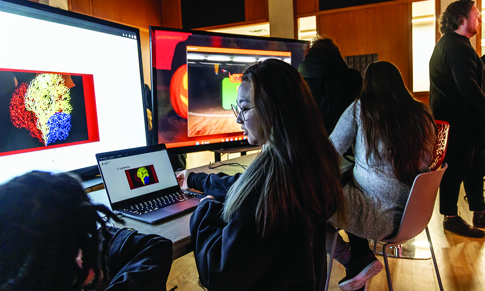 Students in SMU’s B.A. in Art degree program work on digital compositions at Meadows School of the Arts.