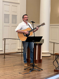 Darren DeMent playing guitar