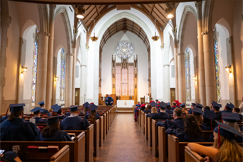 Image of graduates sitting during the rotunda ceremony